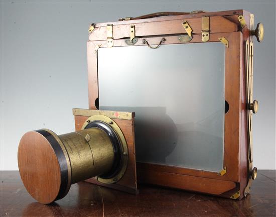 A late 19th century mahogany and brass full plate bellows camera,